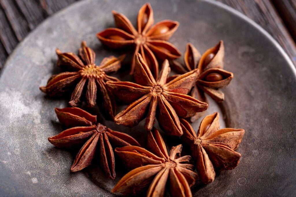 Whole dried star anise pods close view